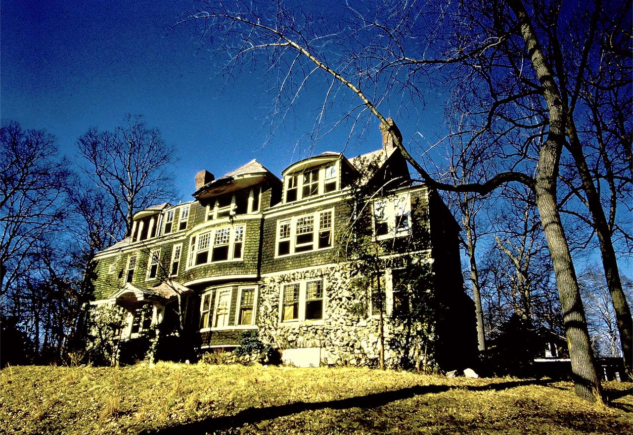 elegant large house with broken windows
