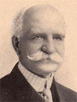 old man with bushy white mustache in starched collar and tie