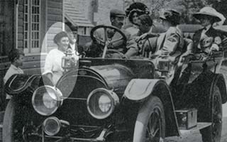 photograph detail of toll-keeper attending vehicle