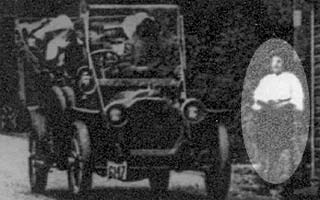 postcard detail of toll-keeper attending vehicle