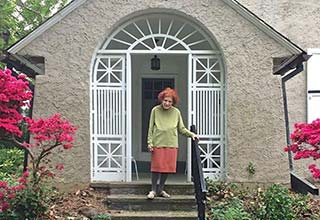 standing in her doorway in her last years